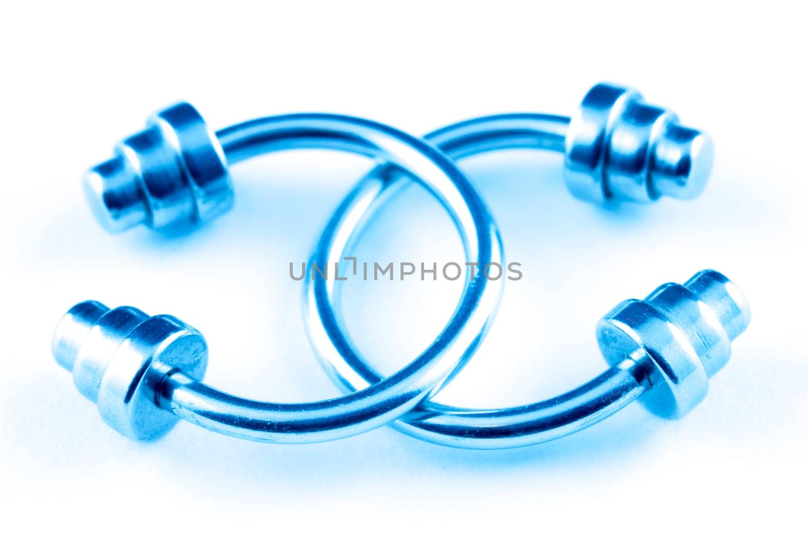 Piercing earrings in a blue tone