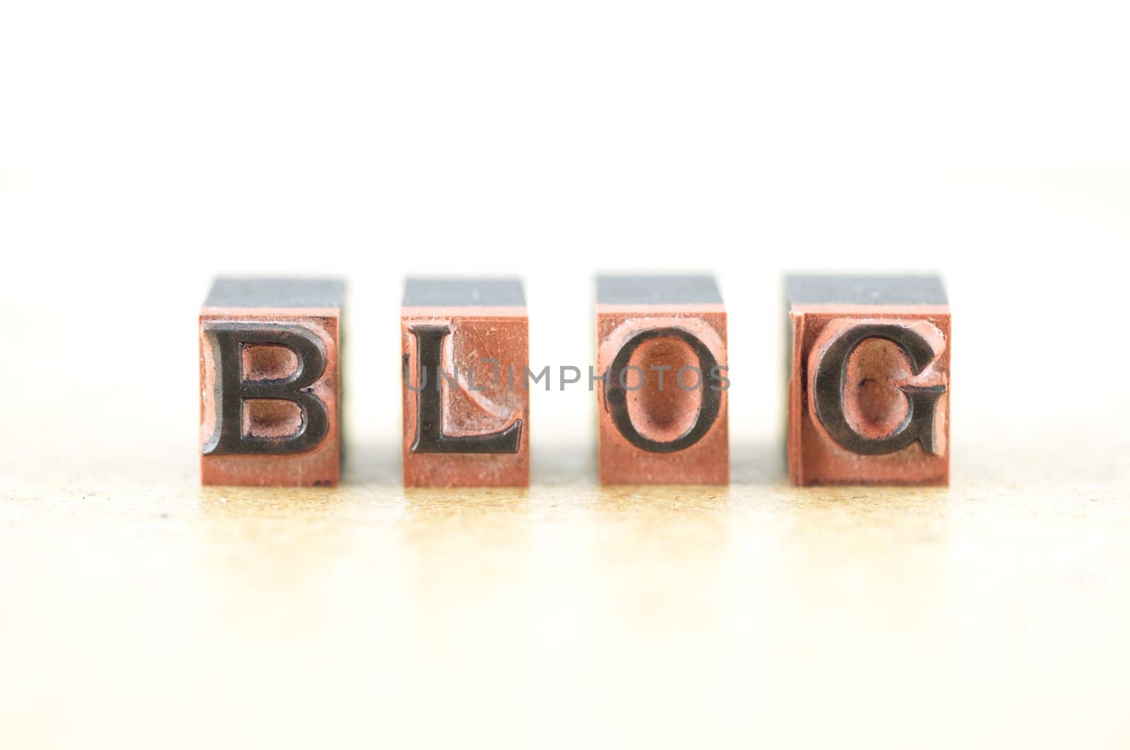 Word "blog"" spelled out in letterpress letters."