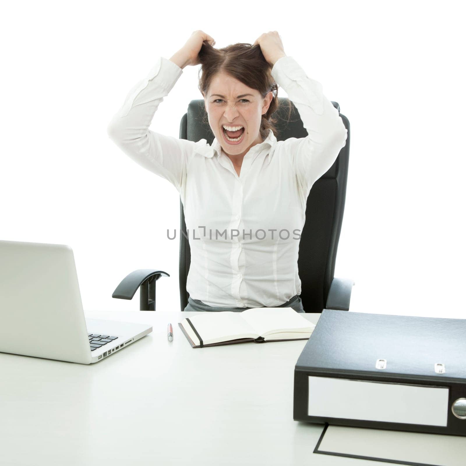 young brunette business woman is frustated hands on head and hair