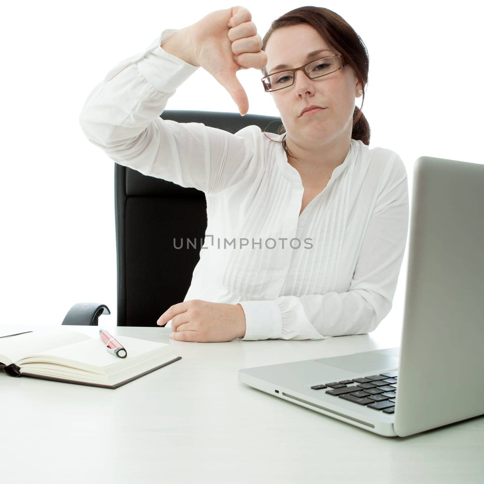 young brunette businesswoman with glasses on desk thumb down