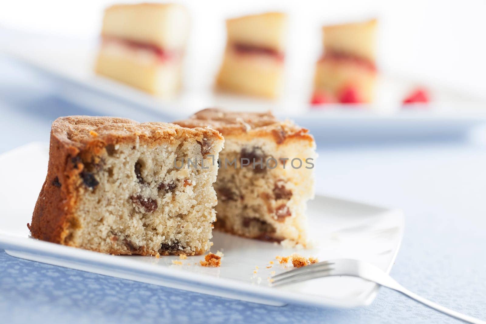 Wedge slice of fruitcake made with raisins