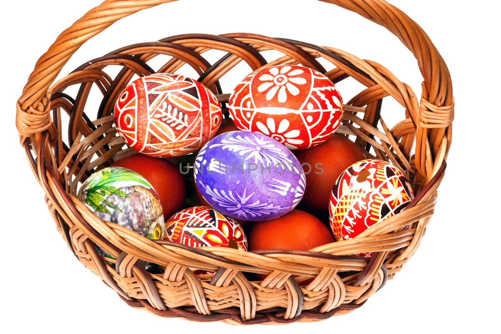 Detail of the painted Easter Eggs in wicker basket - basket full of Ester Eggs