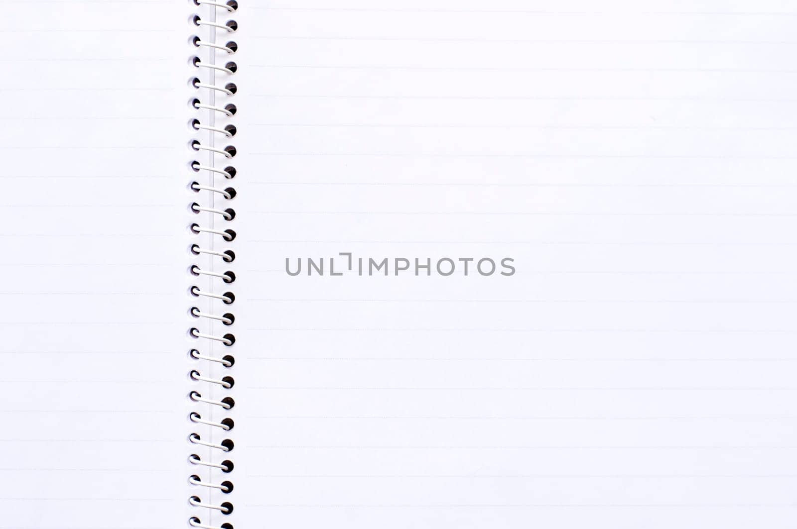 notebook page with binding ring, for image manipulation.