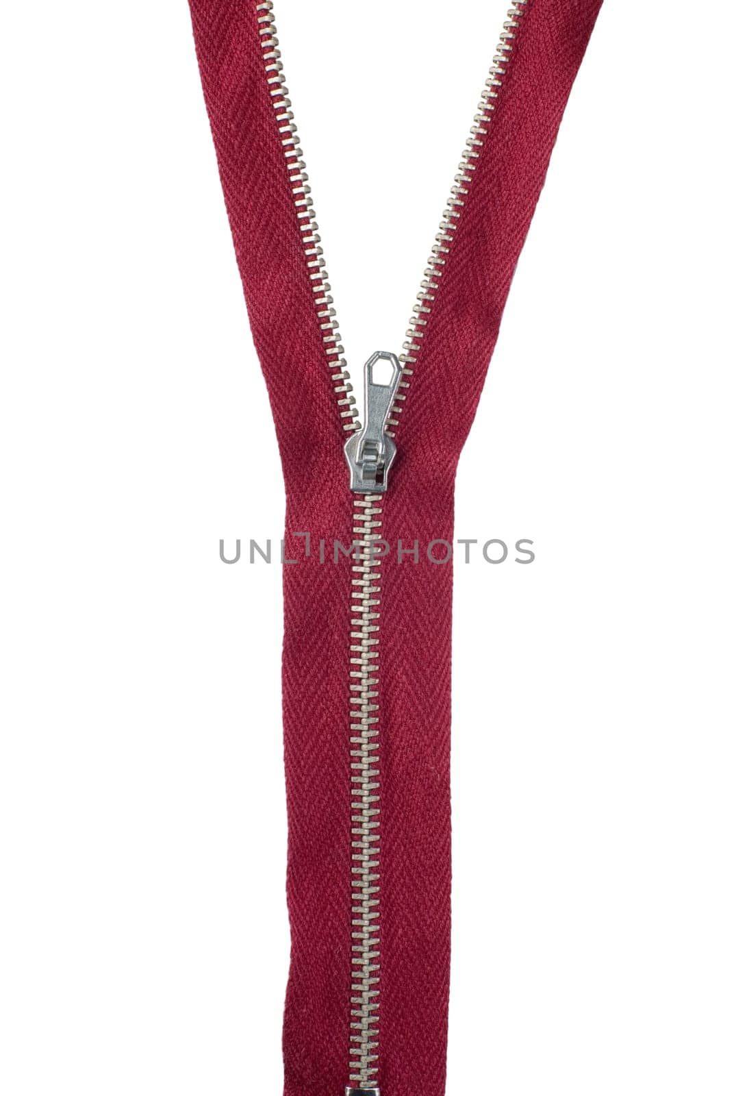 Close-up of a red zipper isolated on white