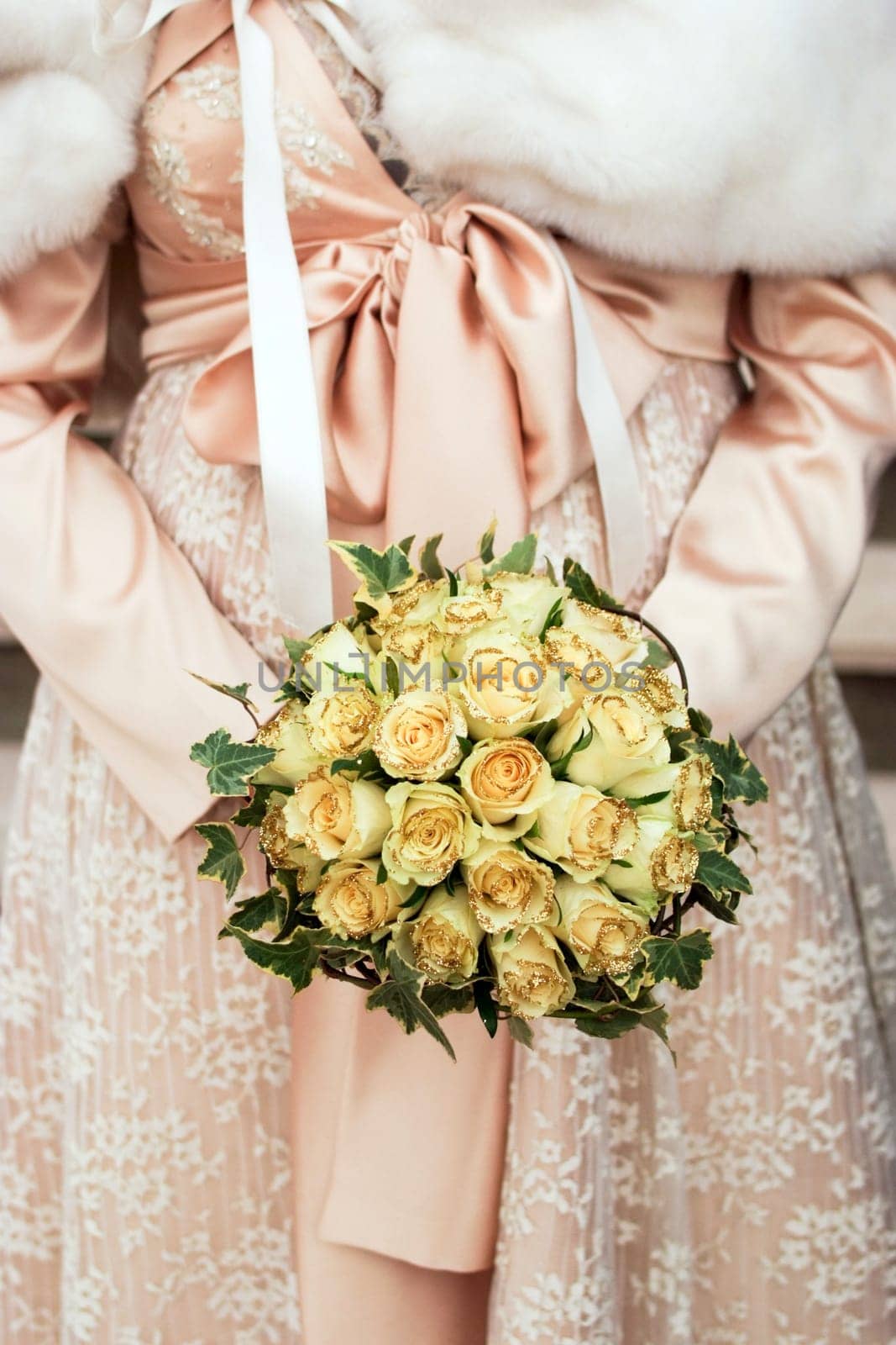 Bride holding wedding bouquet