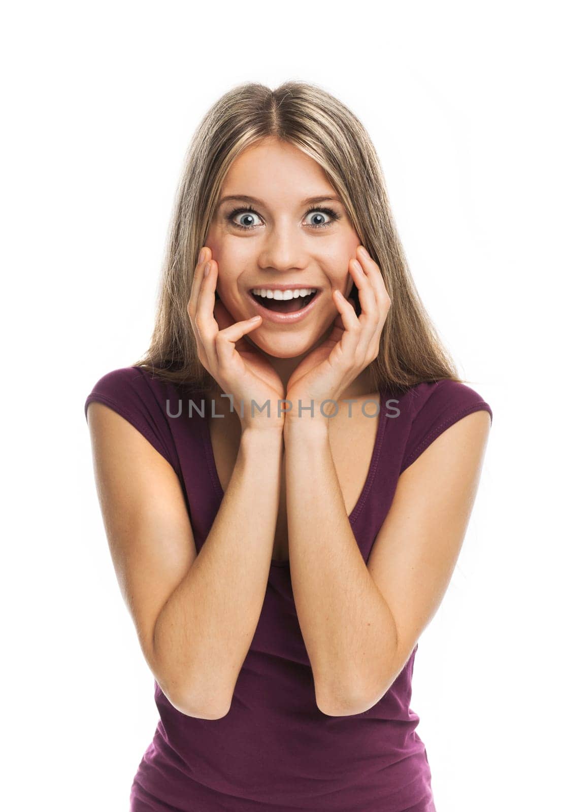 Young blond woman looking very surprised, on white