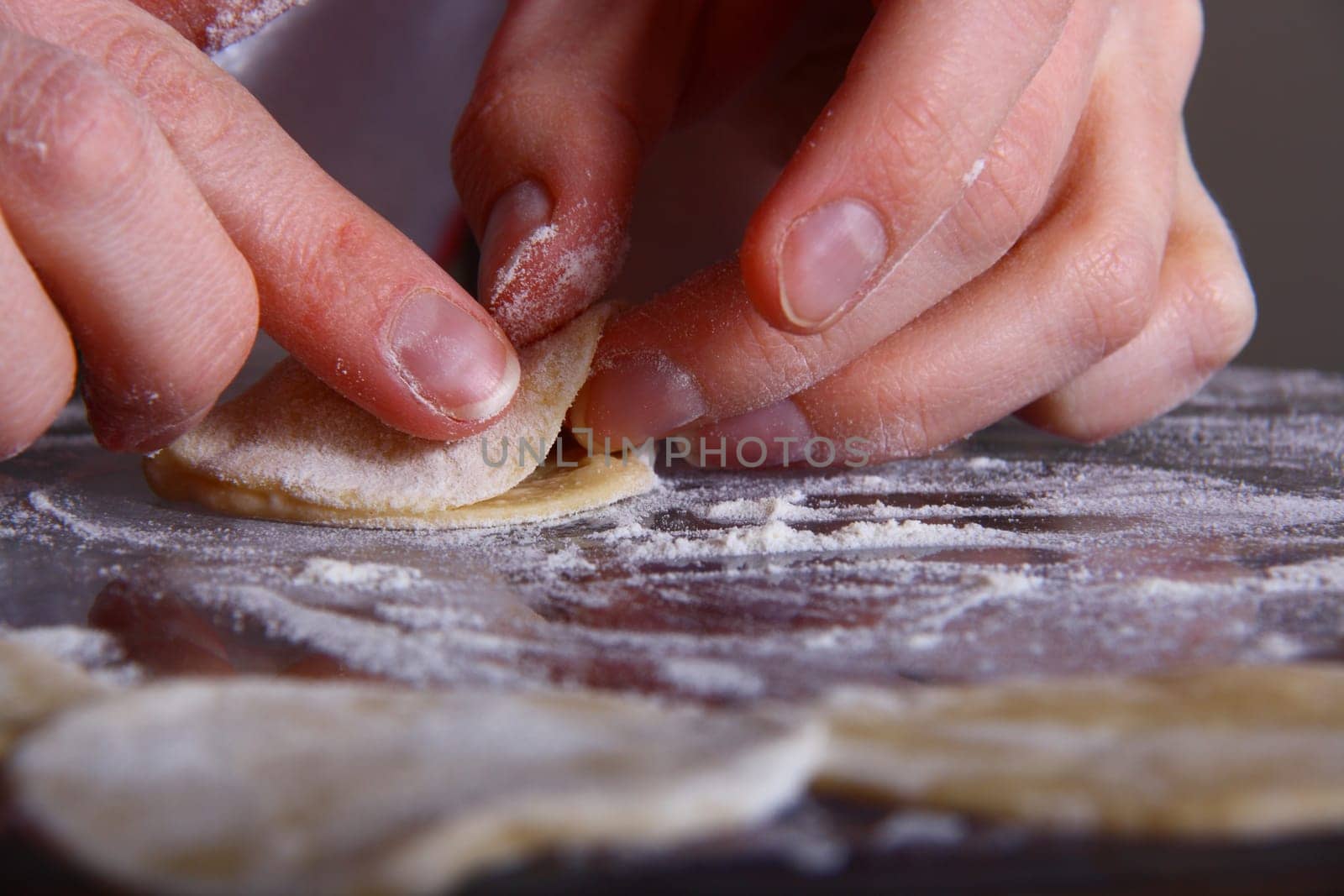 hand made ravioli getting prepared on table