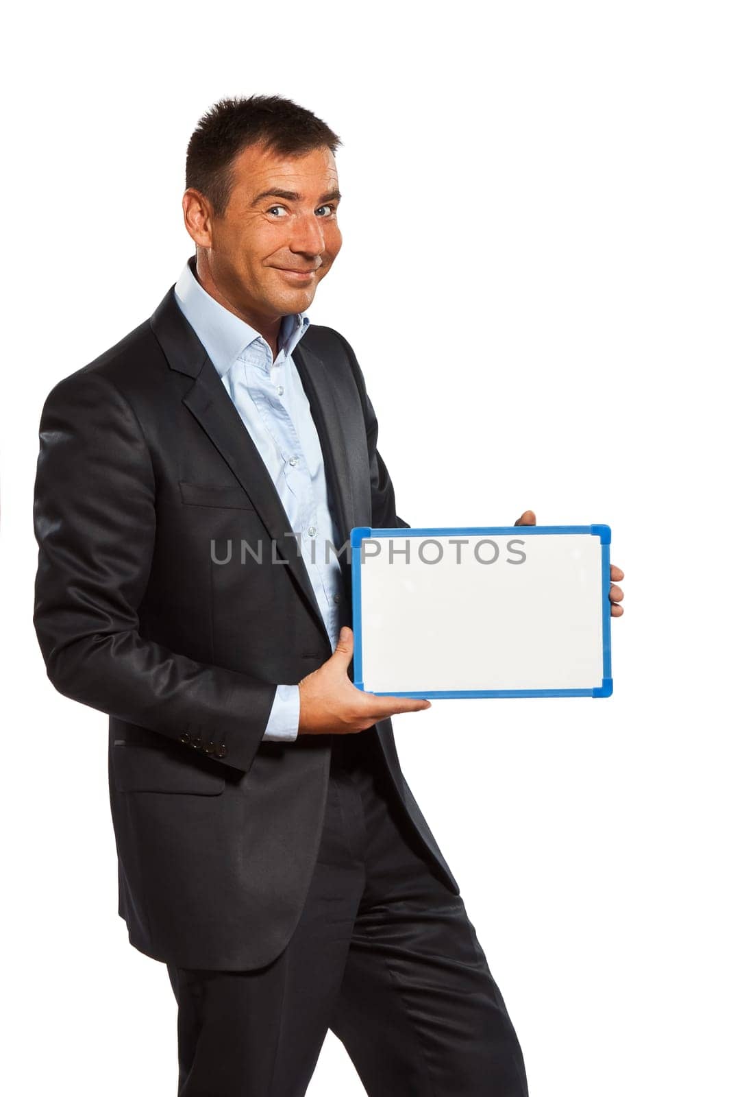 one caucasian business man holding showing whiteboard in studio isolated on white background