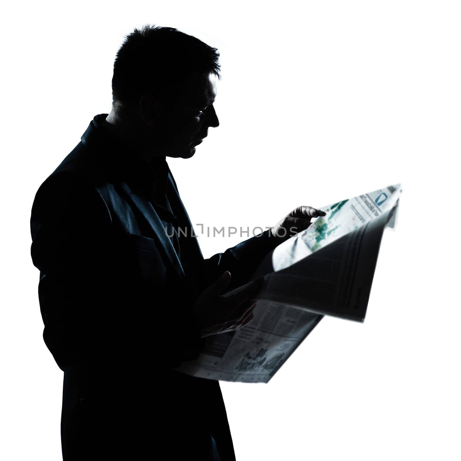 one caucasian man portrait silhouette reading newspaper in studio isolated on white background