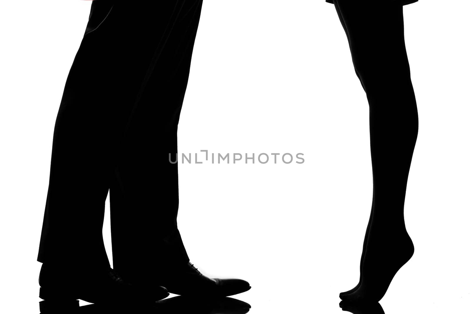 one caucasian detail legs feet couple man and woman tiptoe lovers teenderness in studio silhouette isolated on white background