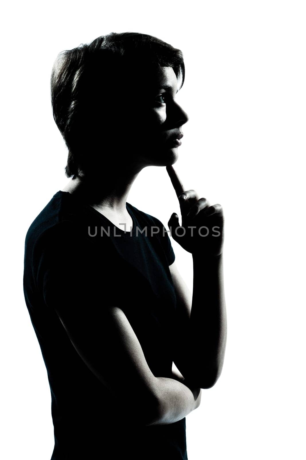 one caucasian young teenager silhouette boy or girl thinking portrait in studio cut out isolated on white background