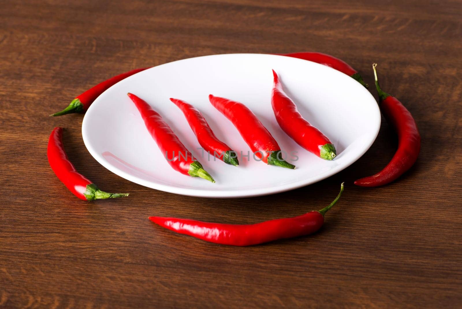 Red hot chilie pepers on plate
