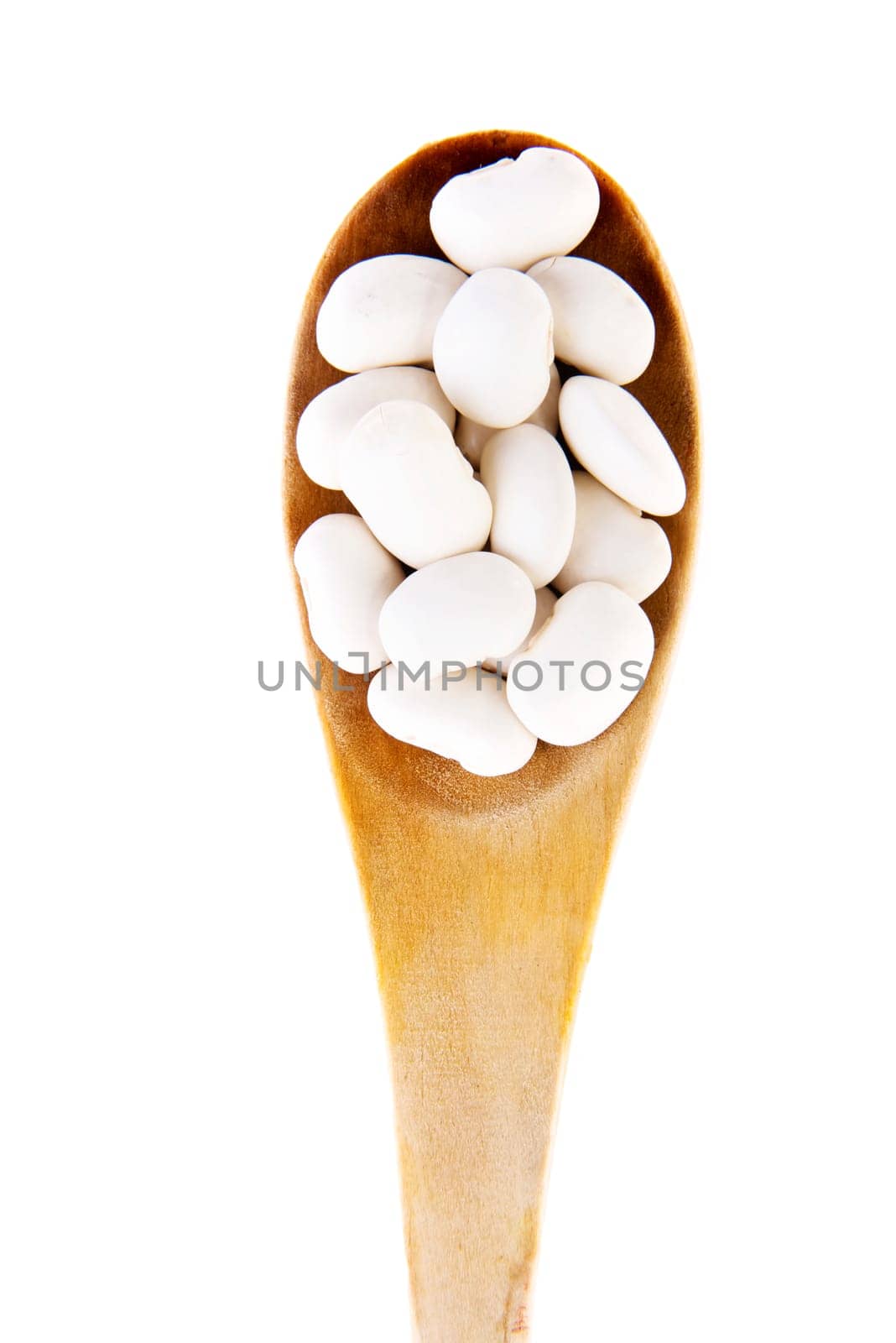 Raw haricot beans  in wooden spoon