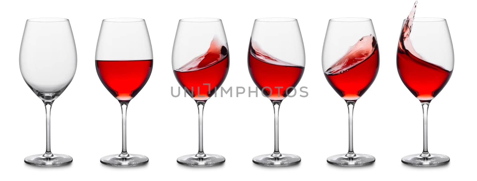 Set of wine glasses empty and with rosé wine