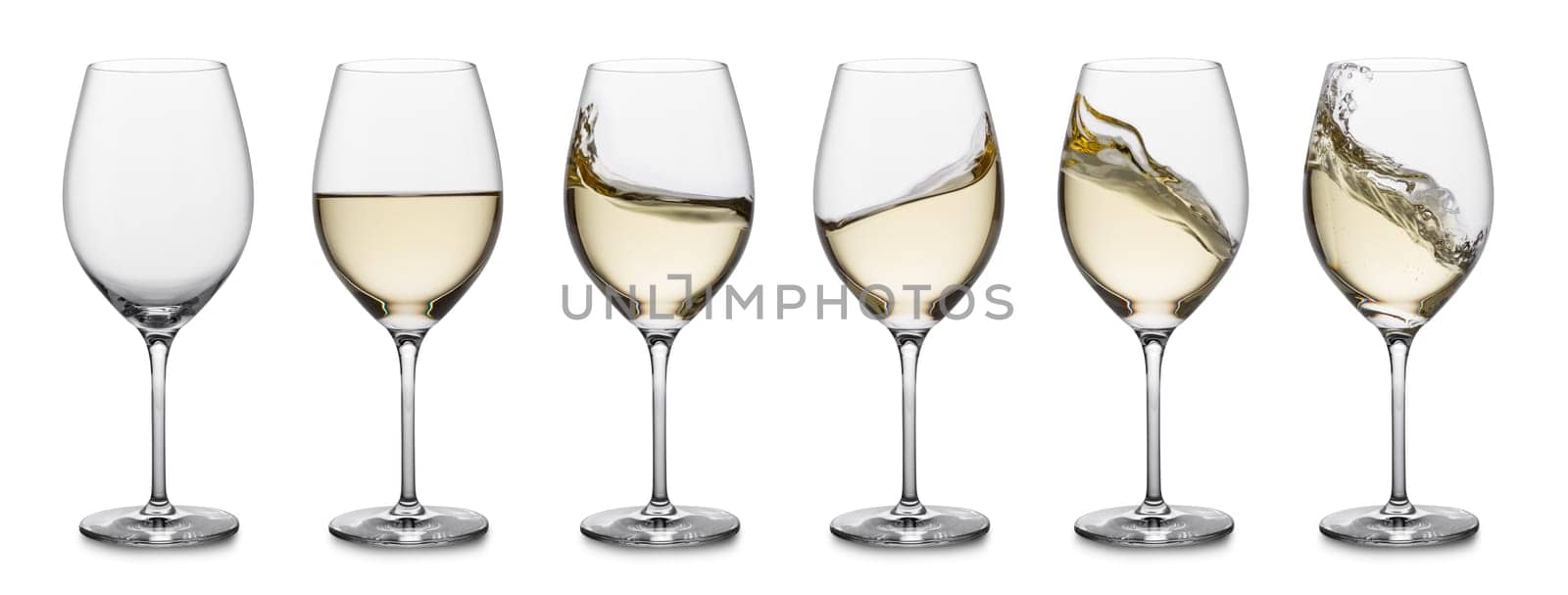 Set of wine glasses empty and with white wine