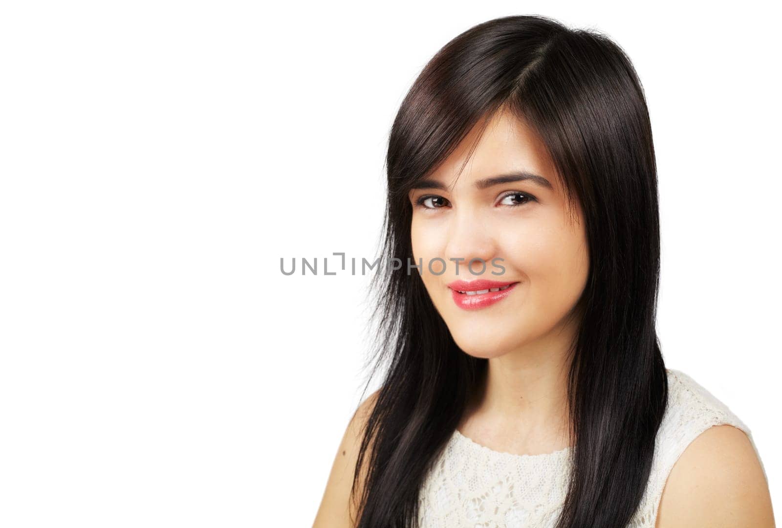 Closeup of a pretty young asian woman with wide smile isolated on white background - copyspace