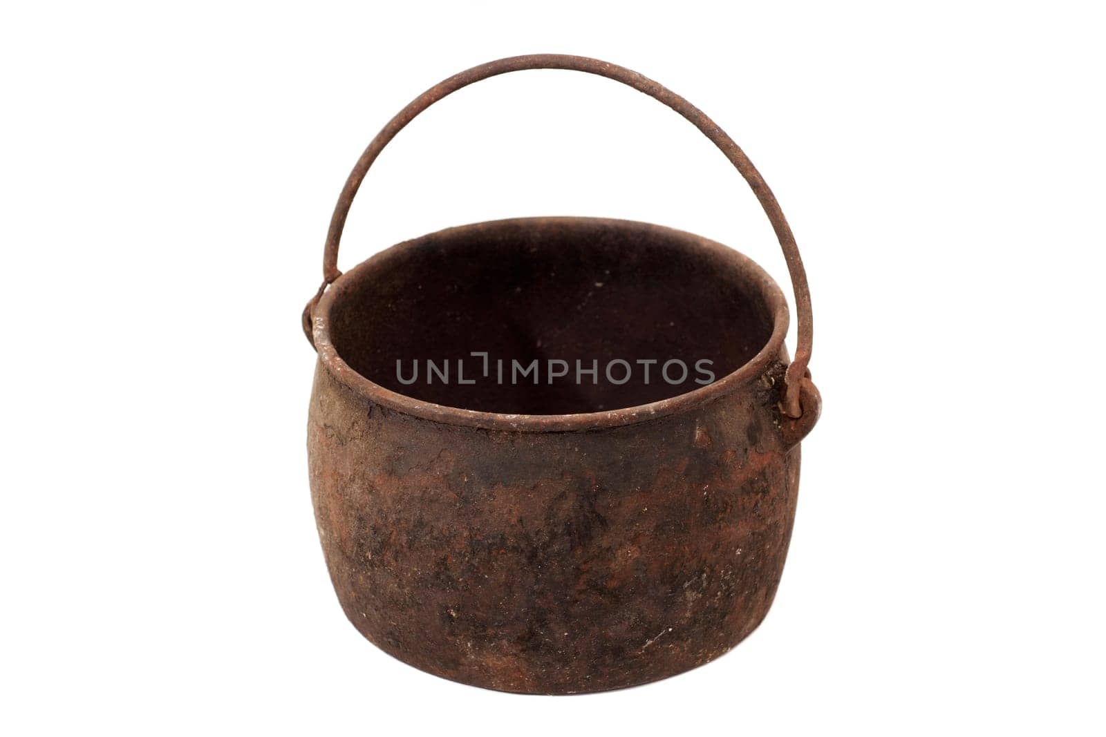 Old metal pot isolated on white