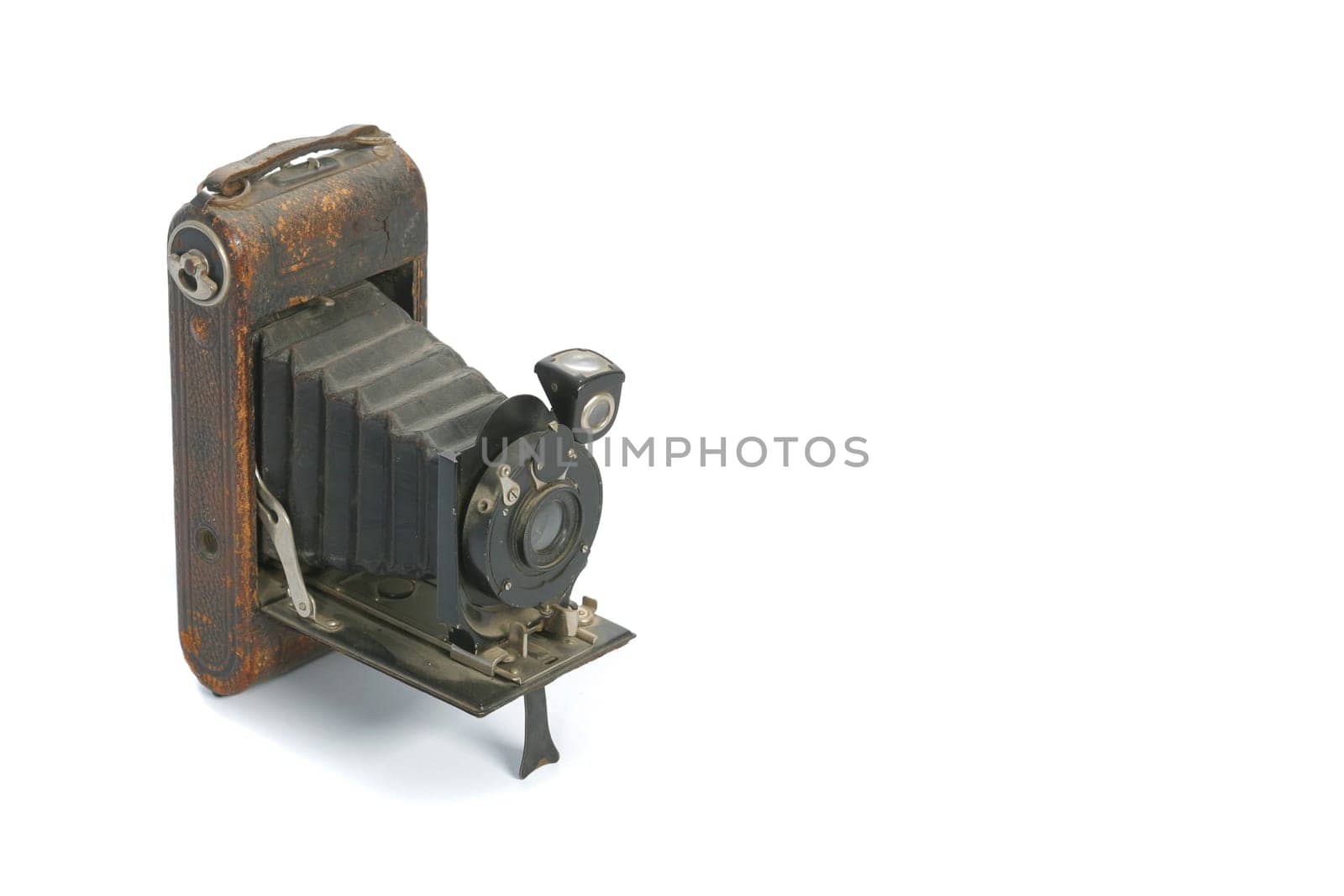 Classic folder bellows camera on white background