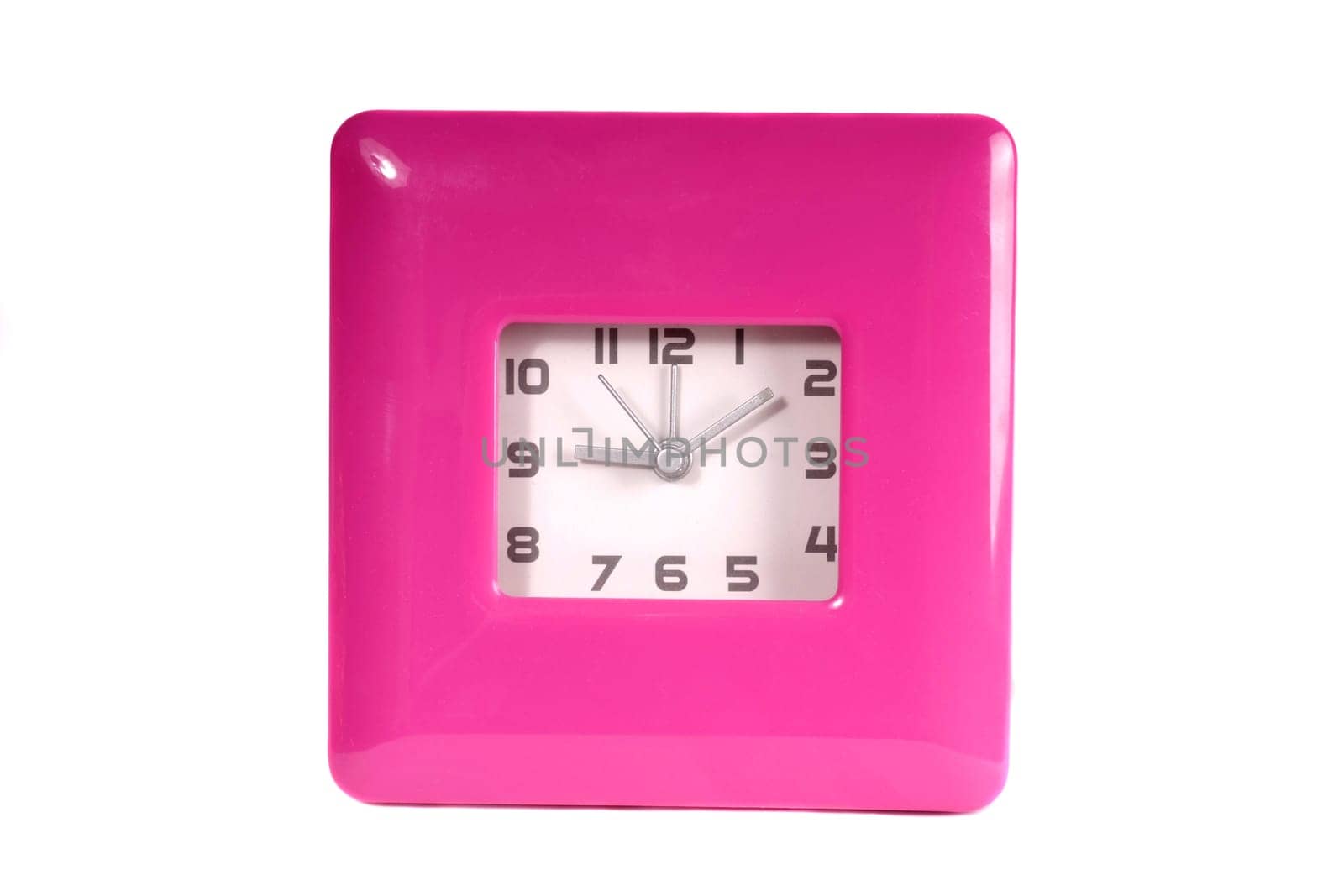 Pink clock isolated on white background