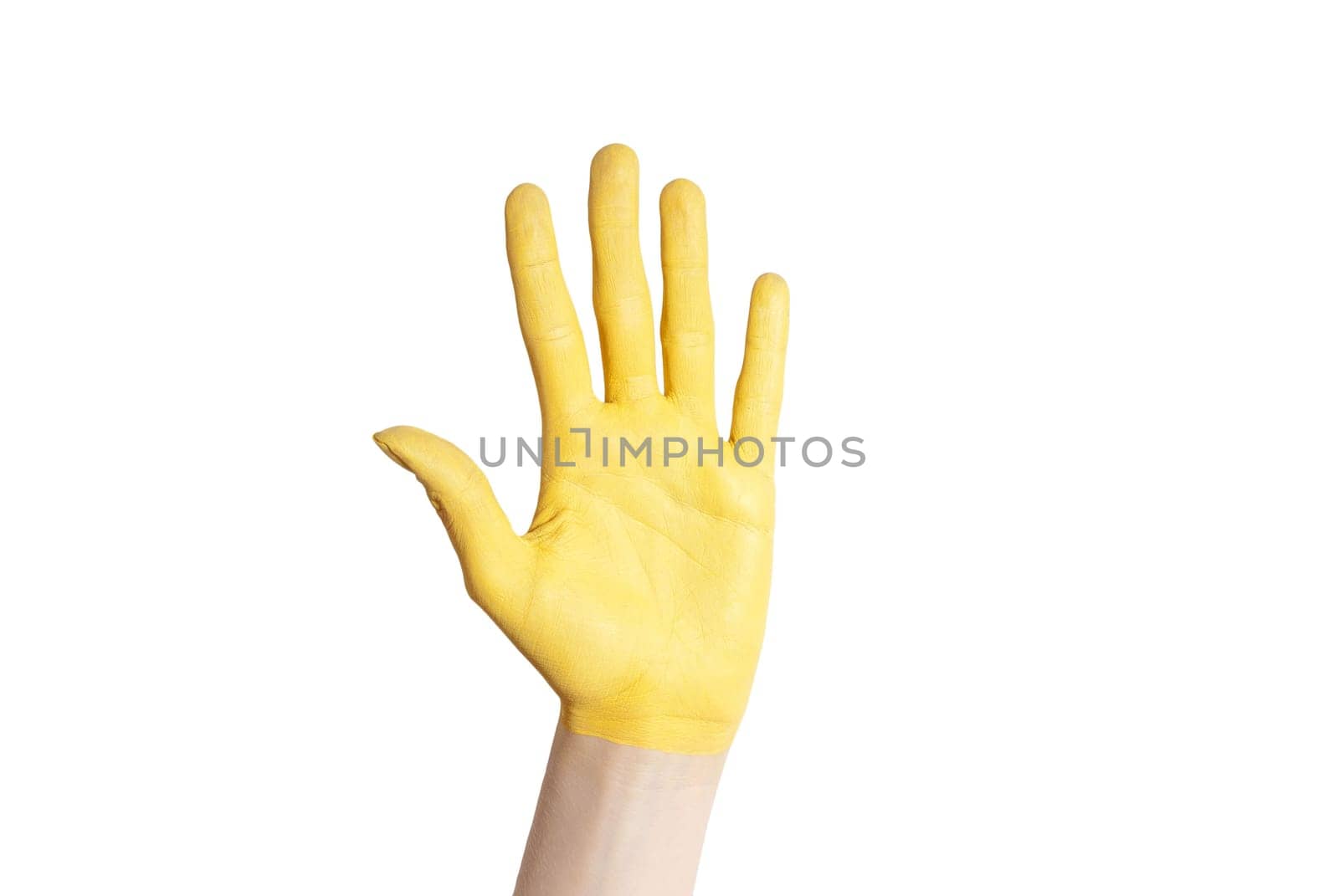 a yellow hand in voting gesture or as a symbol of luck and happiness