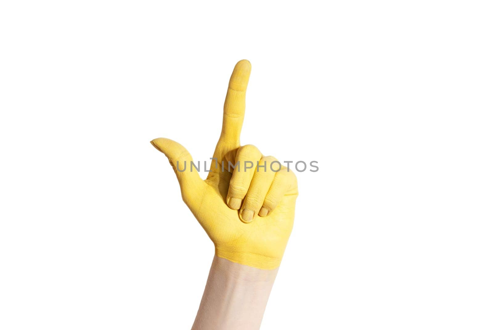 a check mark gesture of a yellow painted hand, isolated