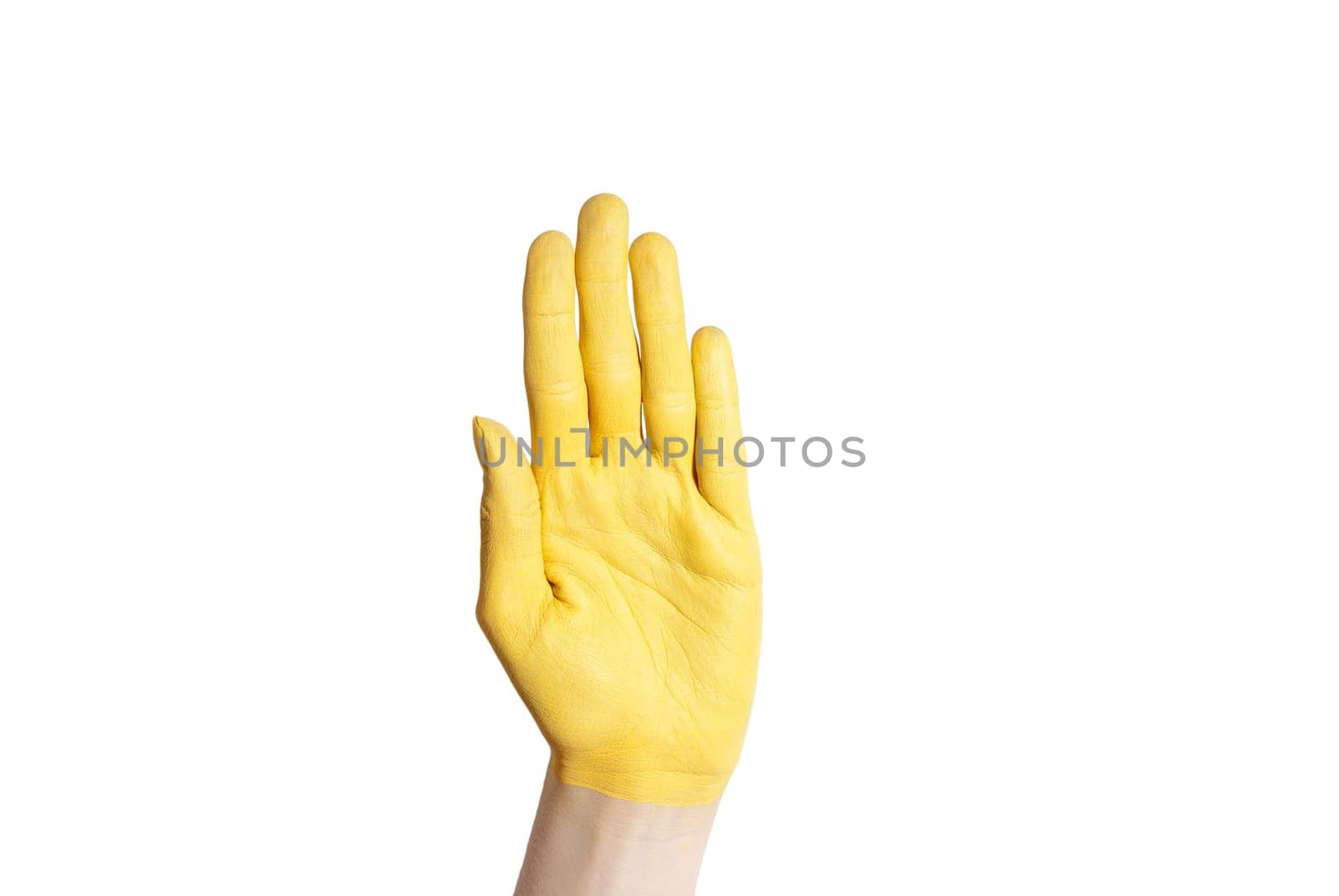 a yellow hand hold up in the air, isolated