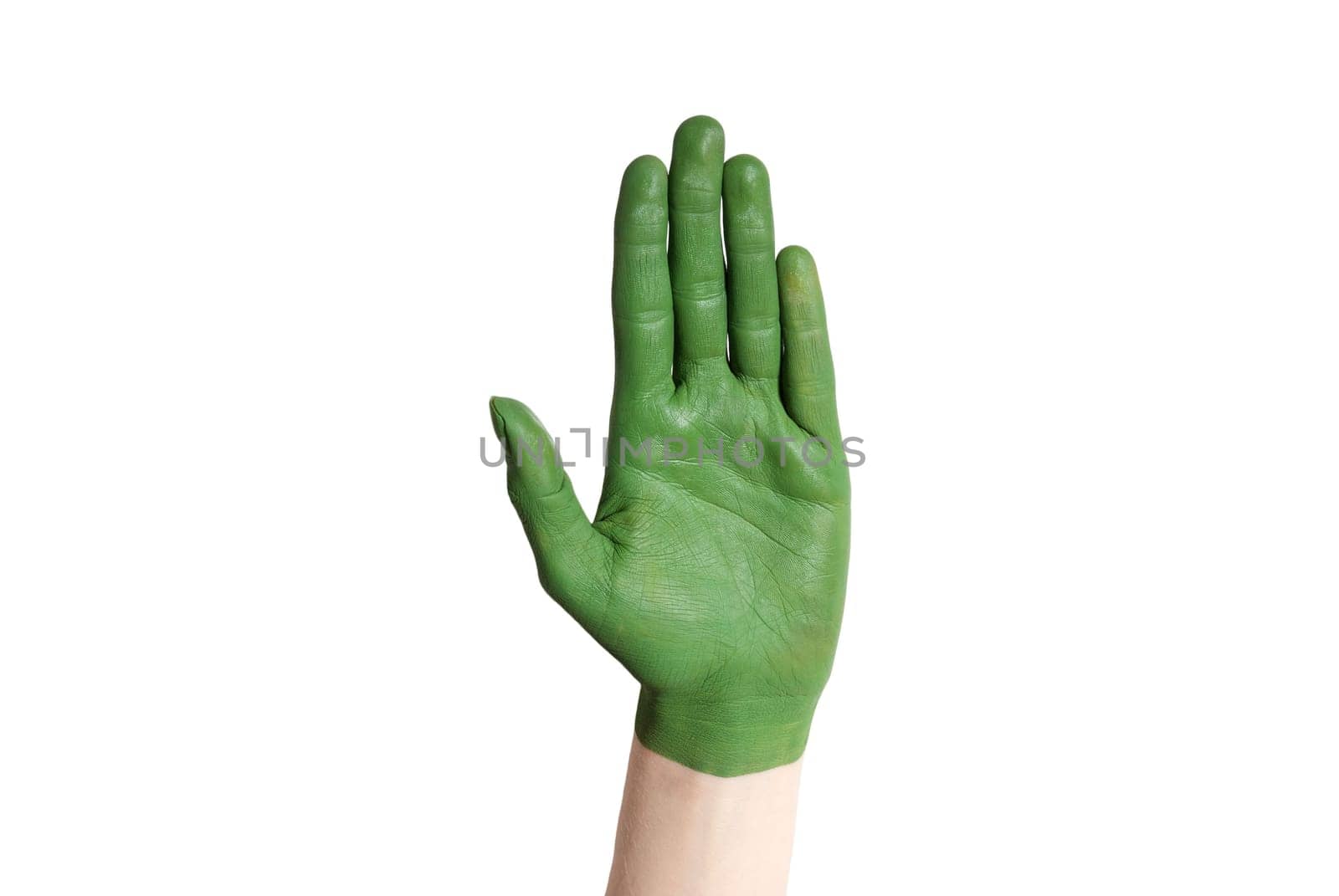 a green painted hand symbolizing nature and environment