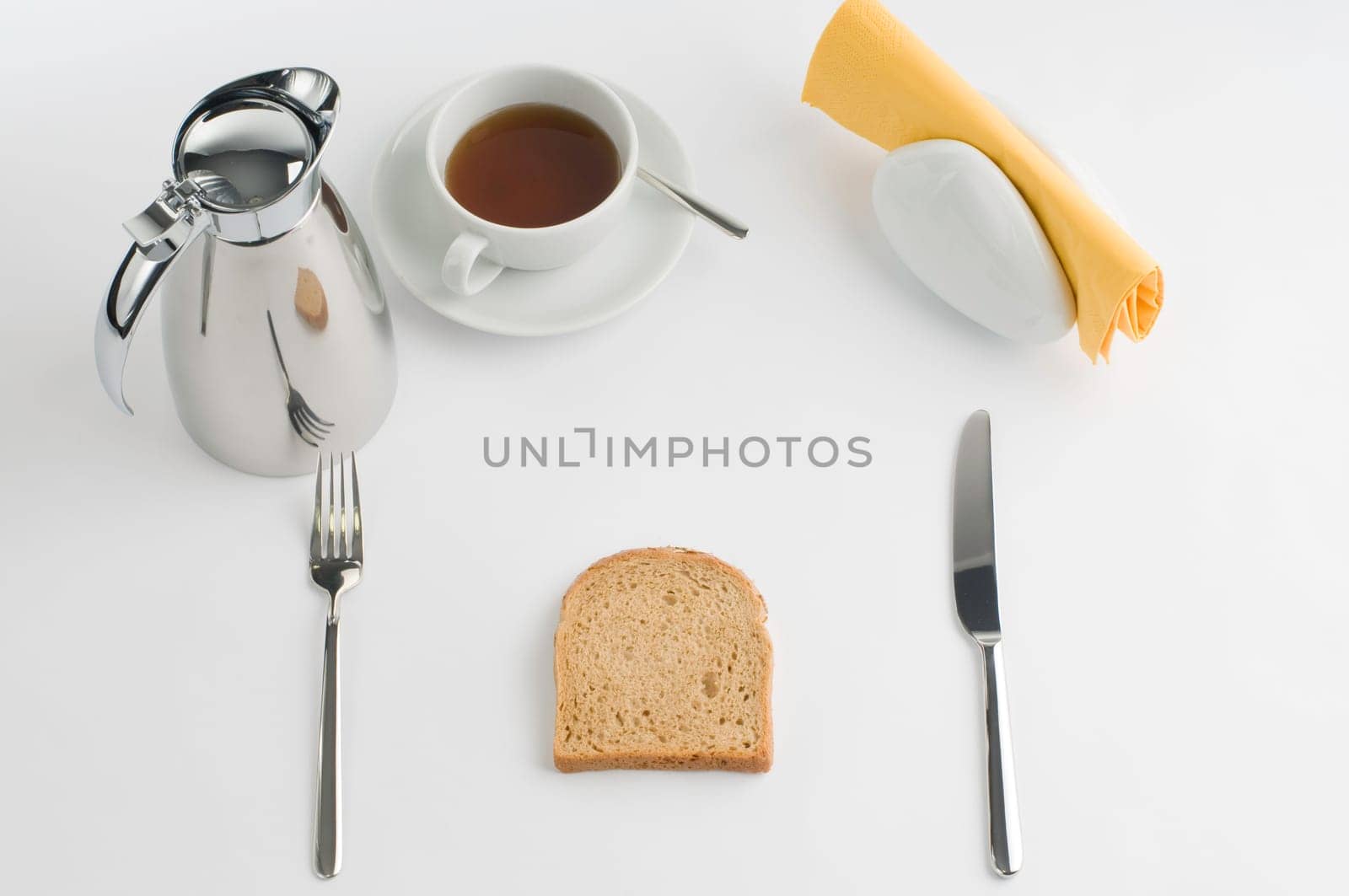 Breakfast table with thermos cup and white china