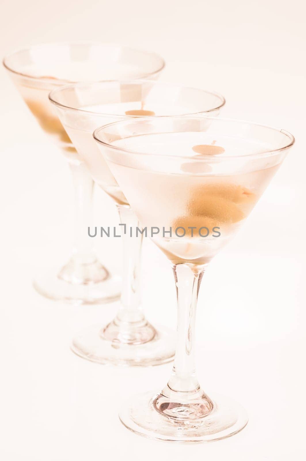 Dry Martini Cocktail made from Gin and a dash of Vermouth garnished with stuffed olives