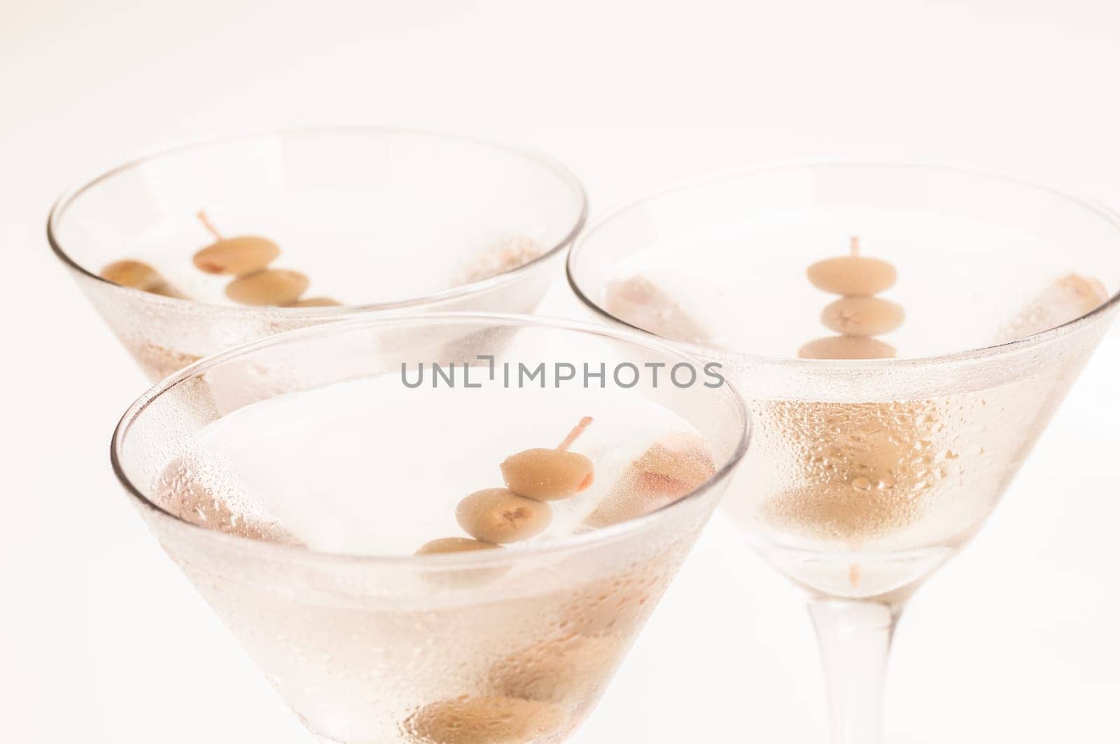 Dry Martini Cocktail made from Gin and a dash of Vermouth garnished with stuffed olives