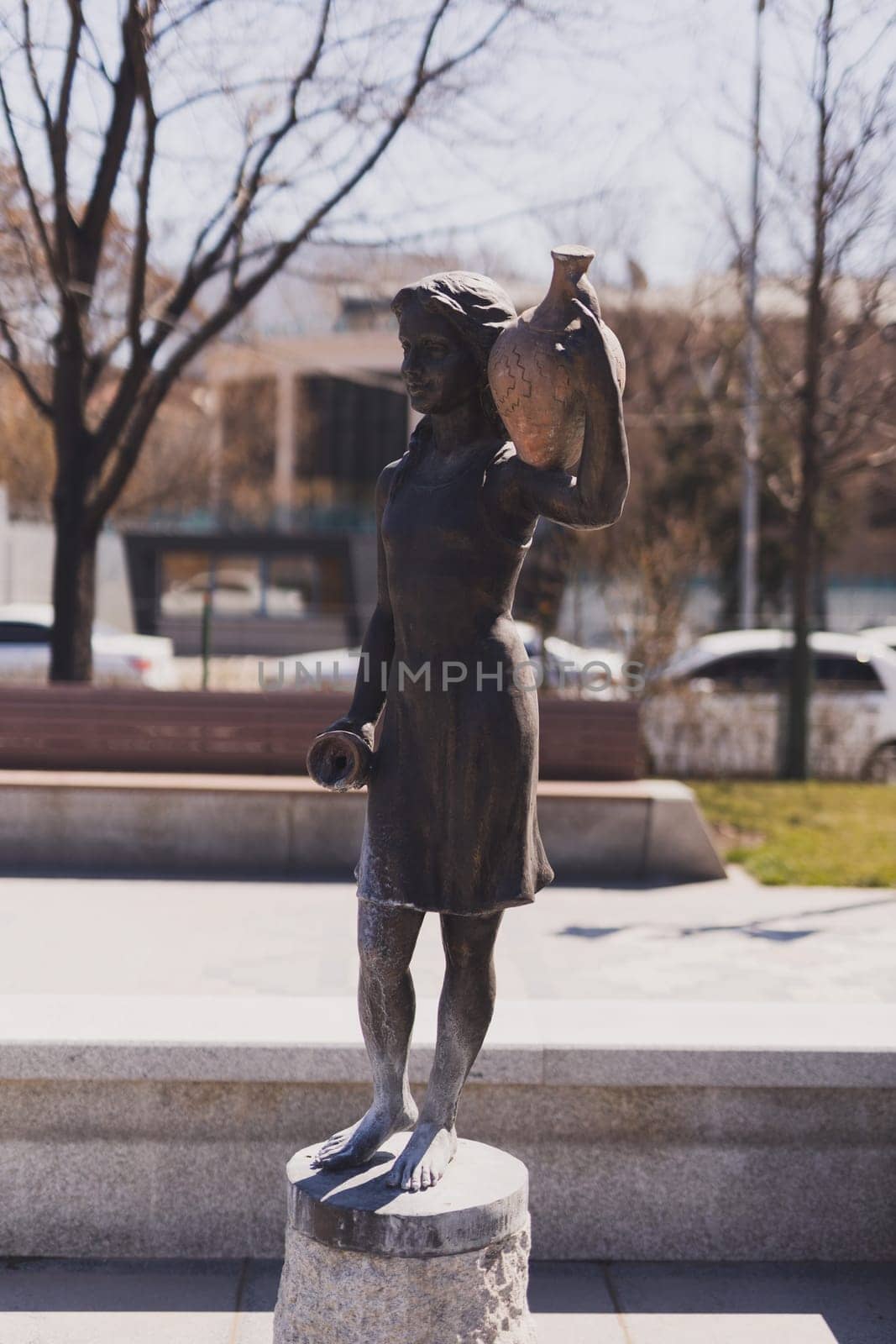 YEREVAN. ARMENIA. 29 MARCH 2022 : A sculpture of a girl with a jug in the park dedicated to the 2800th anniversary of Yerevan
