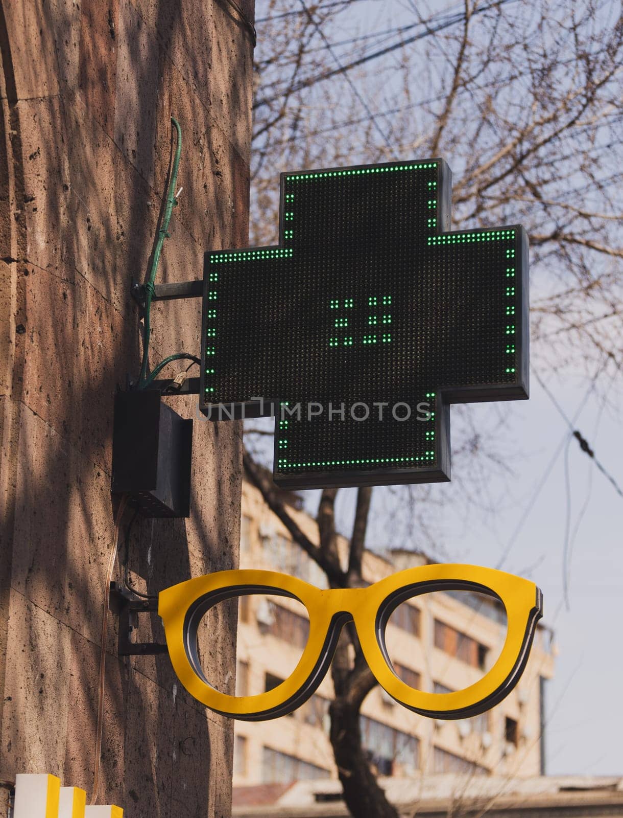 Sign in the shape of an eyeglasses frame. Spectacles store.