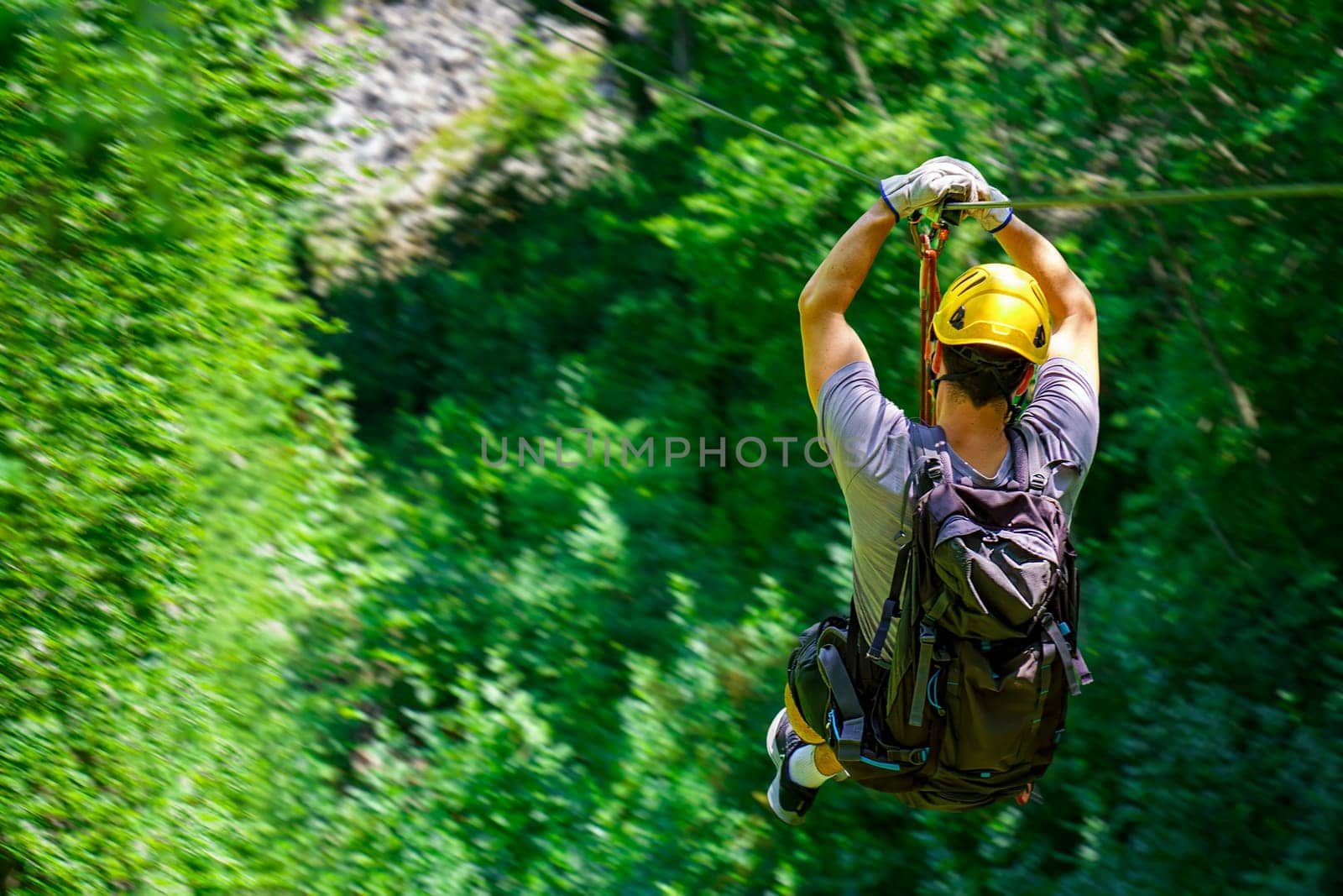 Women Enjoying Thrilling Zipline Experience, Embracing the Exhilaration of Activity-filled Vacation by PhotoTime