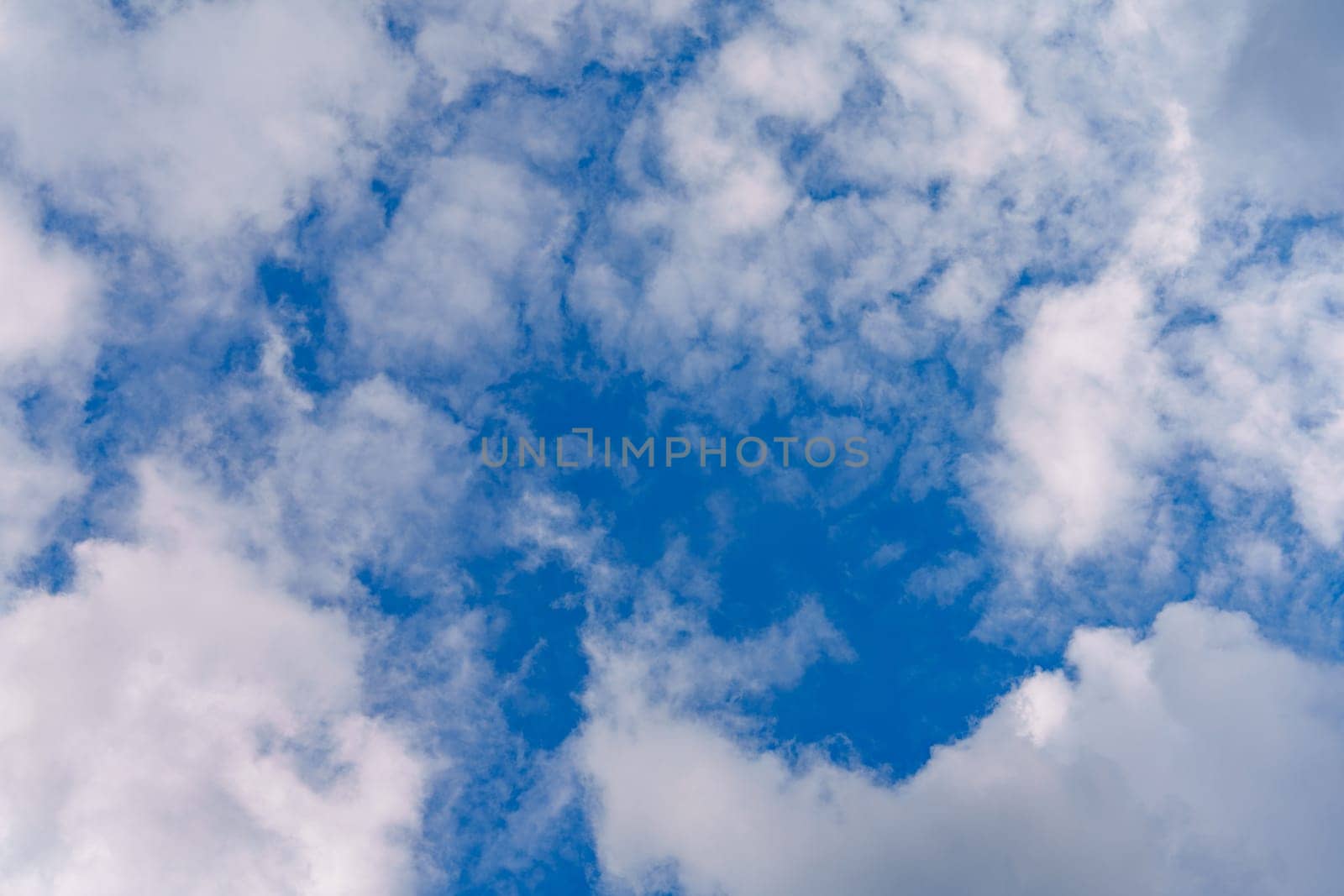 Blue Sky with Lots of White Clouds: Background for Replacement or Inspiring Ideas.
