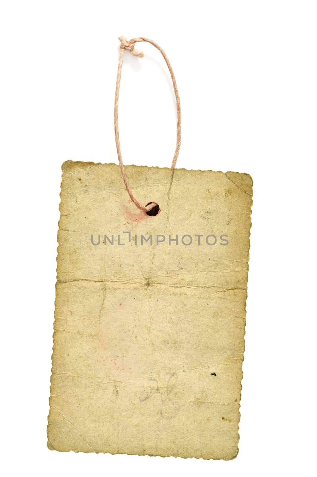 Cardboard price tag or sales label with string on white background