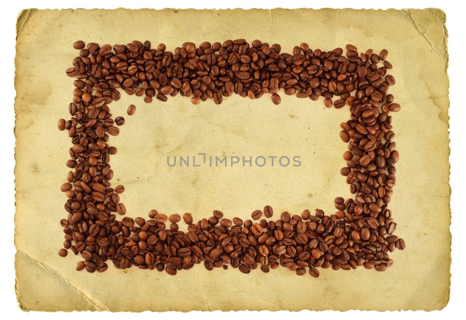 Coffee beans on old paper background