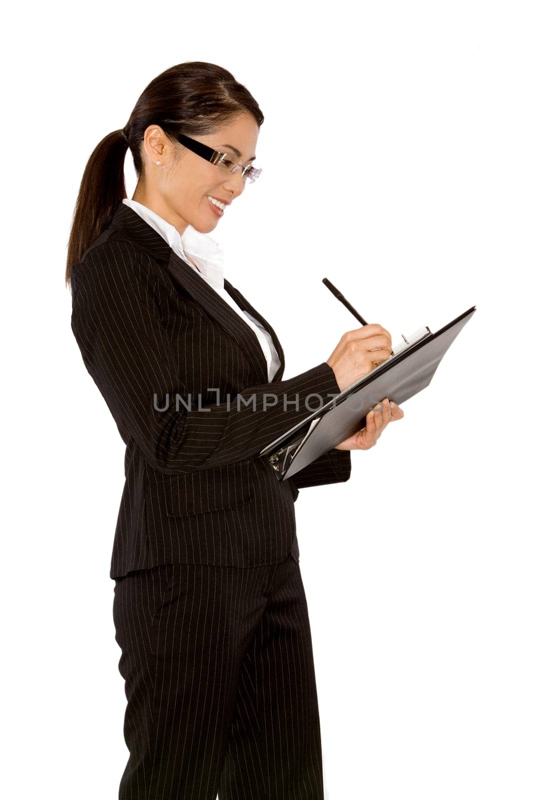 asian business woman writing down her notes