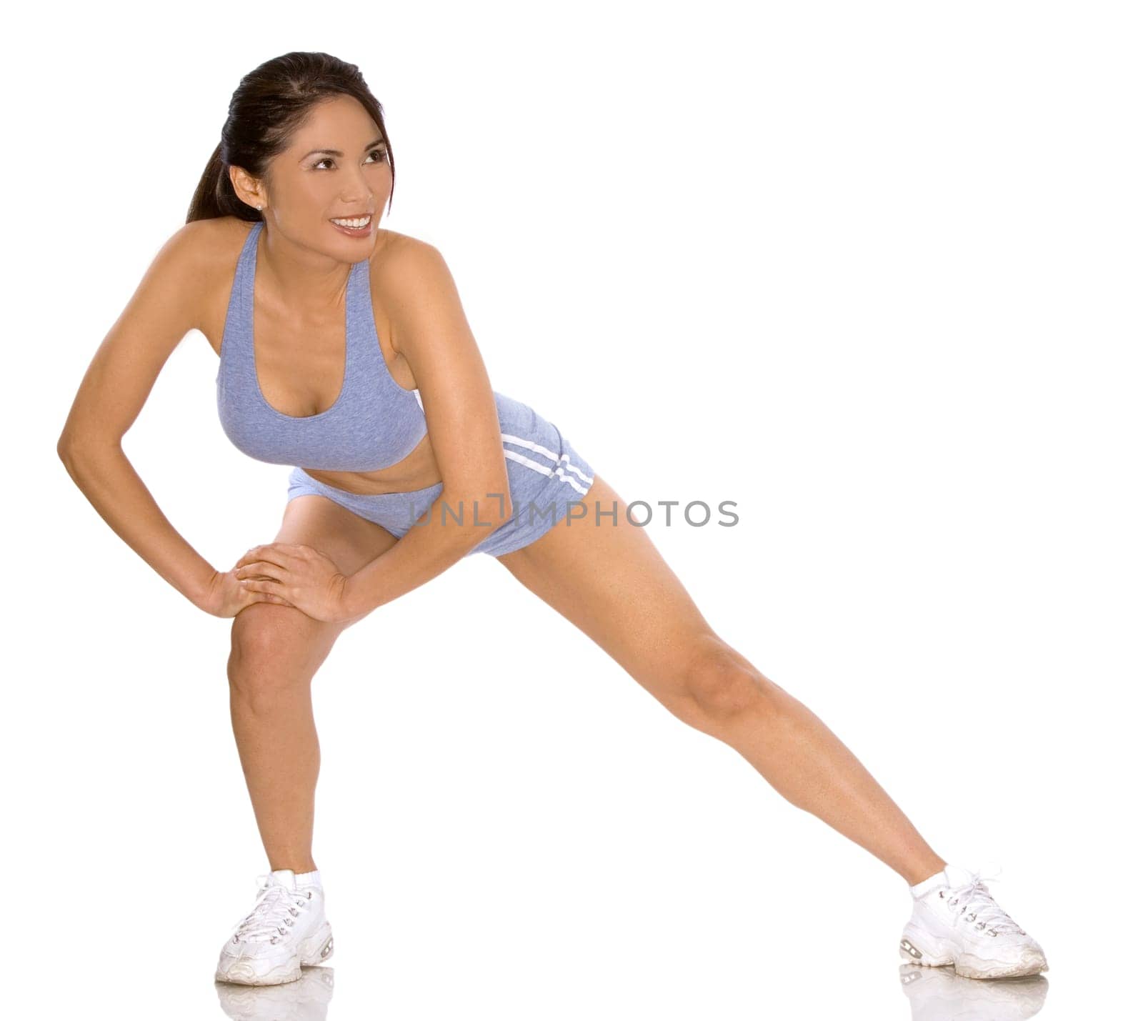 pretty asian woman wearing sport outfit on white