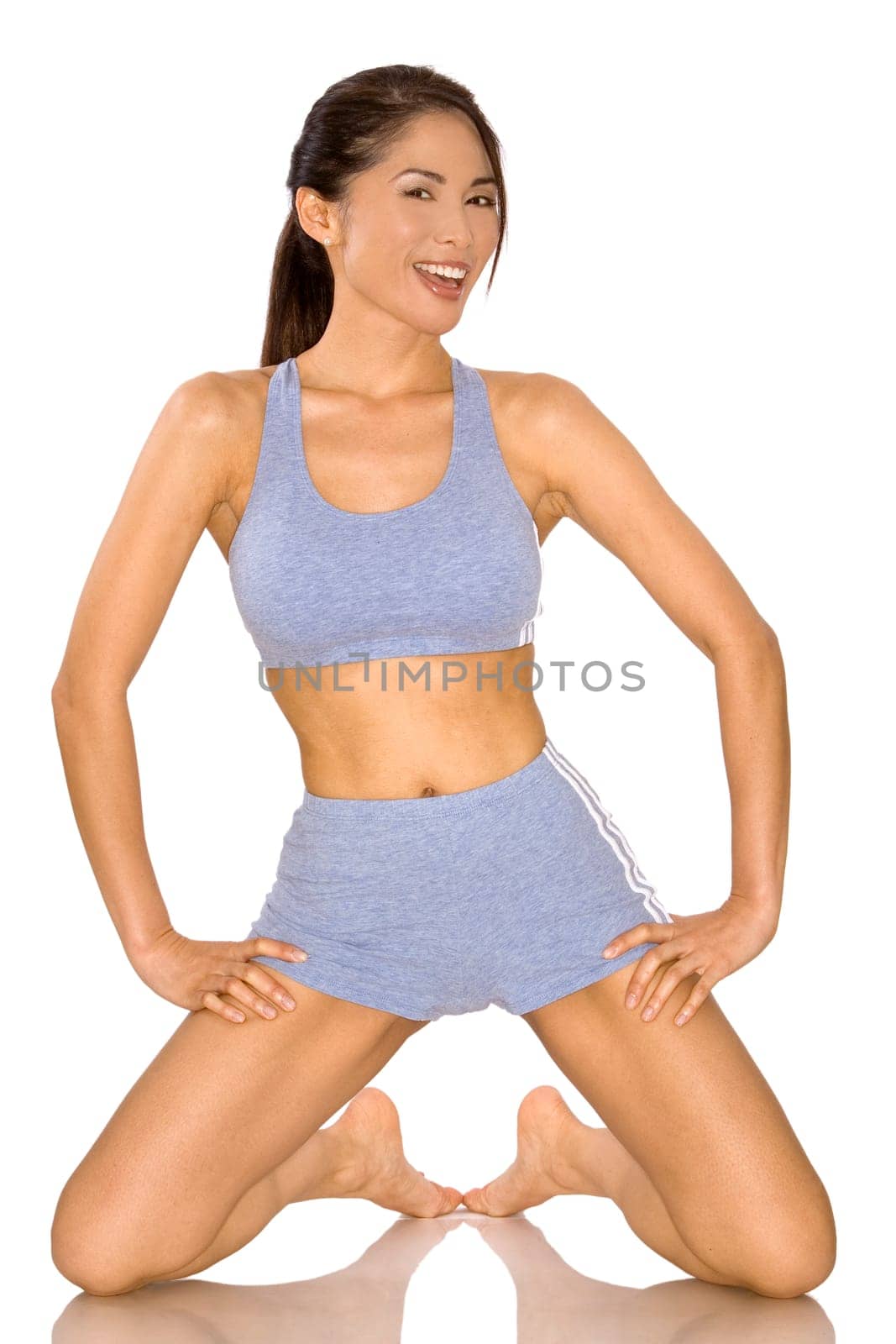 pretty asian woman wearing sport outfit on white
