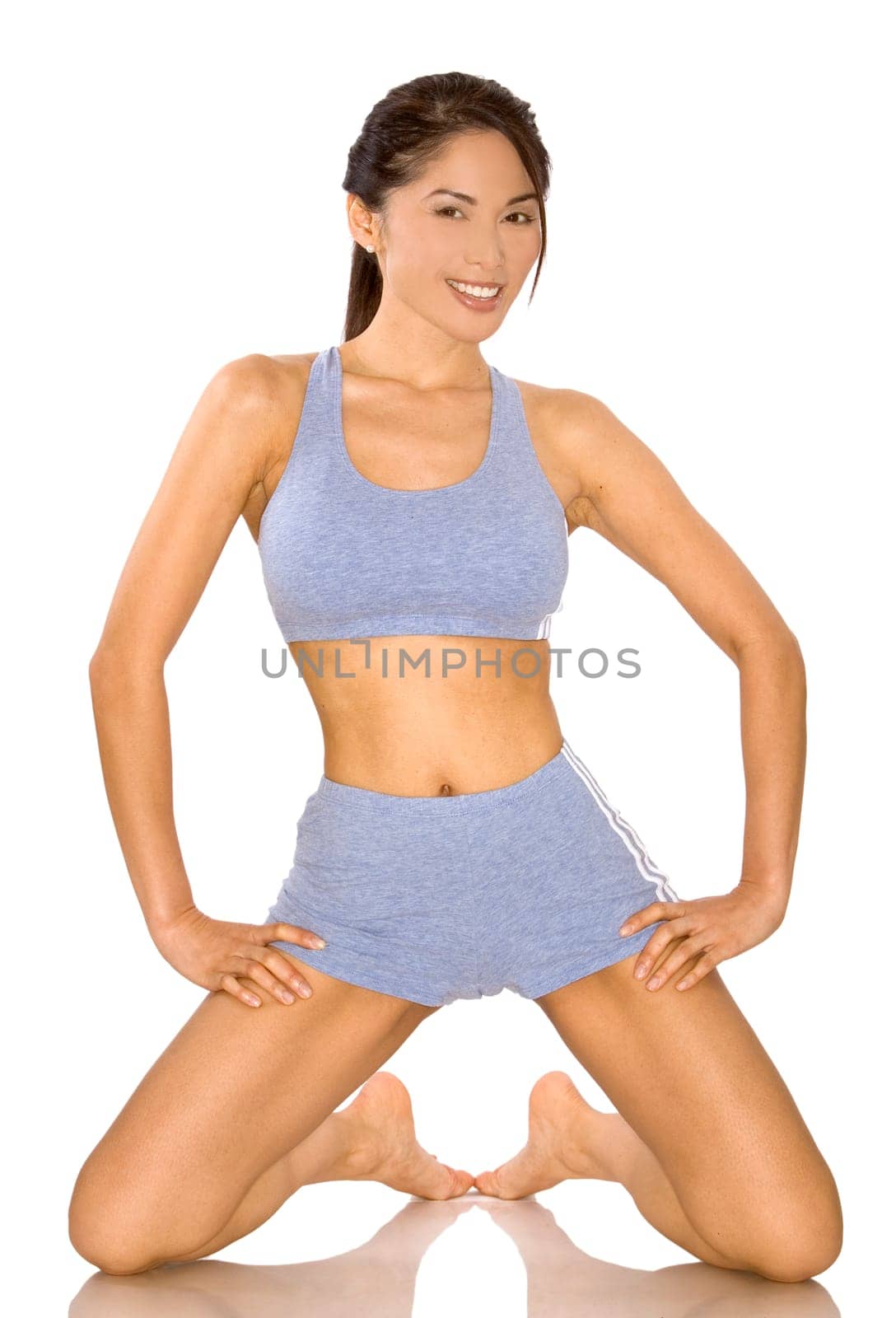 pretty asian woman wearing sport outfit on white