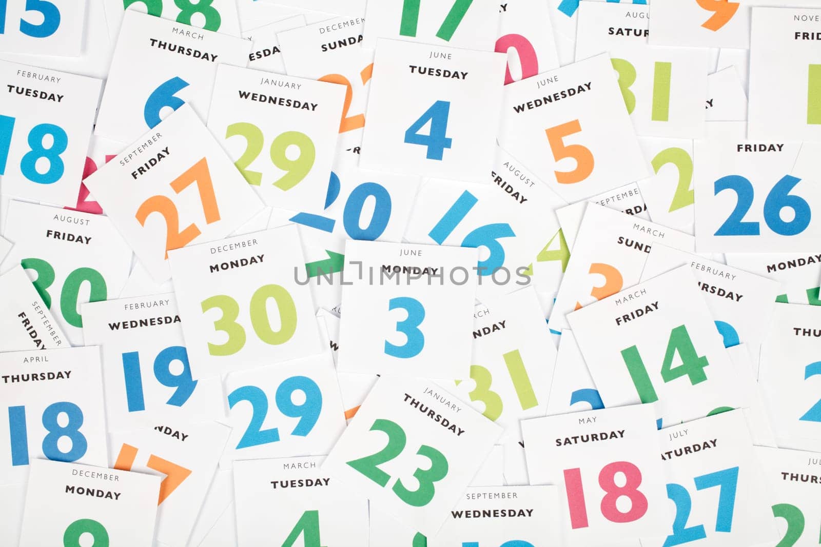 Calendar pieces. Planning and time management concept. Top view.