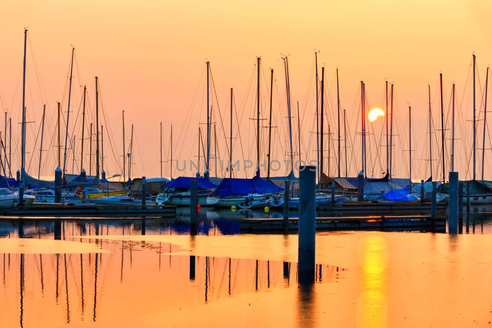 Sunset in the harbour of Estavayer le lac