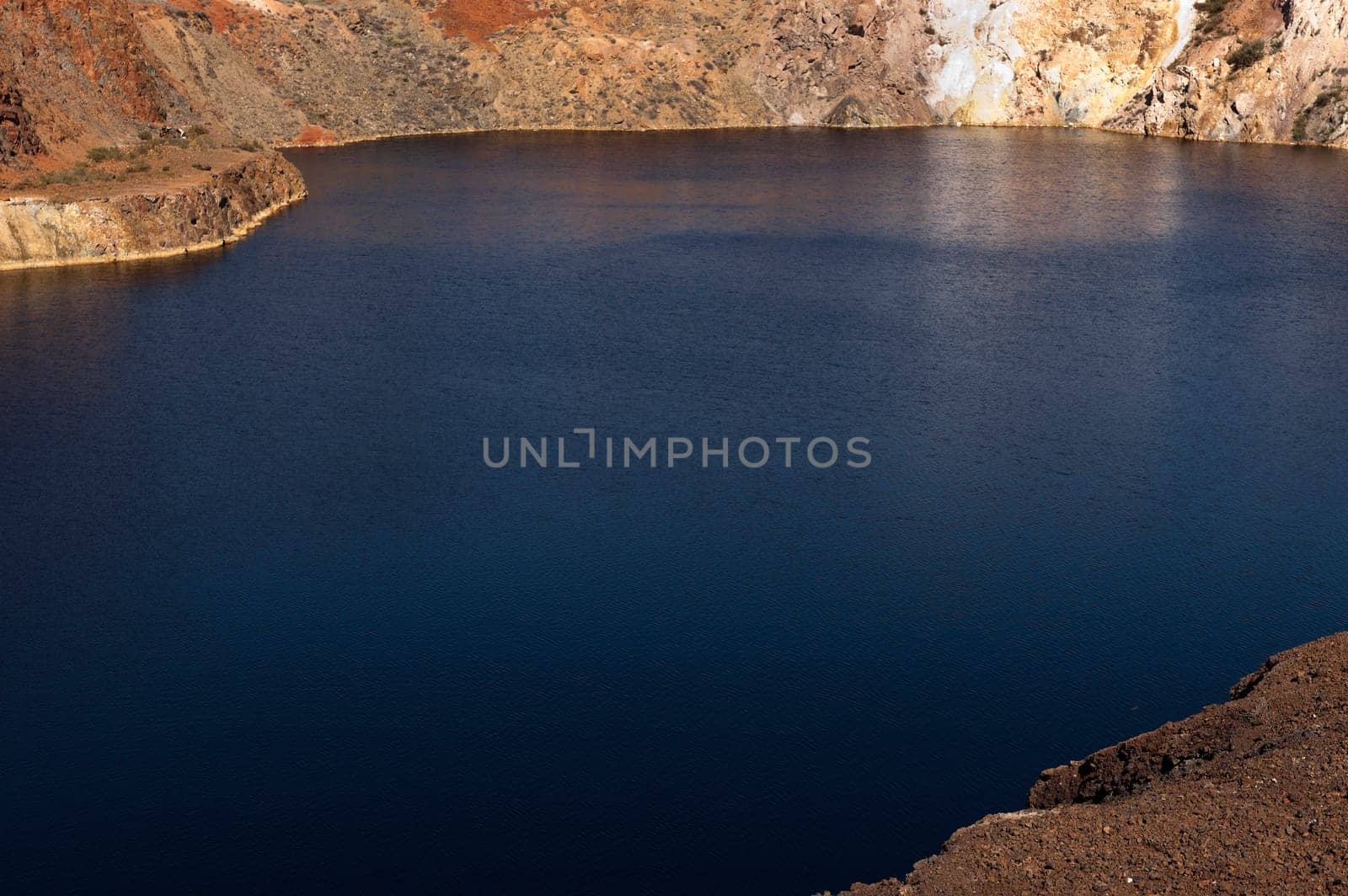 Detail of the São Domingos Mine, a deserted open-pit mine in Mertola, Alentejo, Portugal. This site is one of the volcanogenic massive sulfide ore deposits in the Iberian Pyrite Belt, which extends from the southern Portugal into Spain