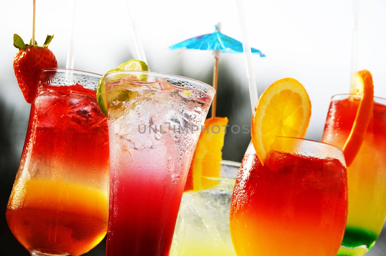 Composition with five glasses of drinks
