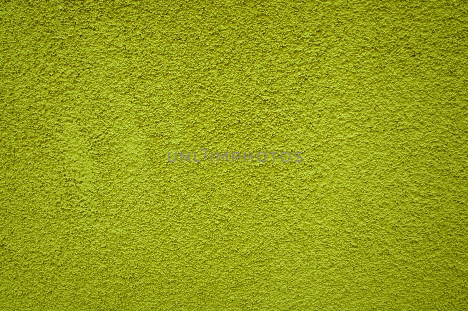 Uneven background: yellow plaster
