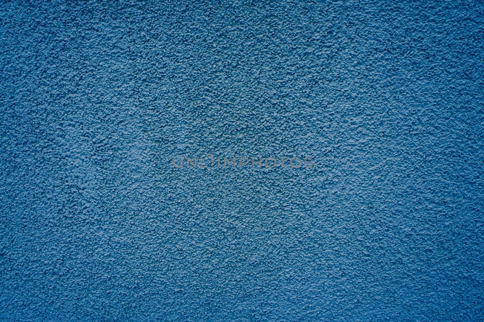 Uneven background: Blue plaster