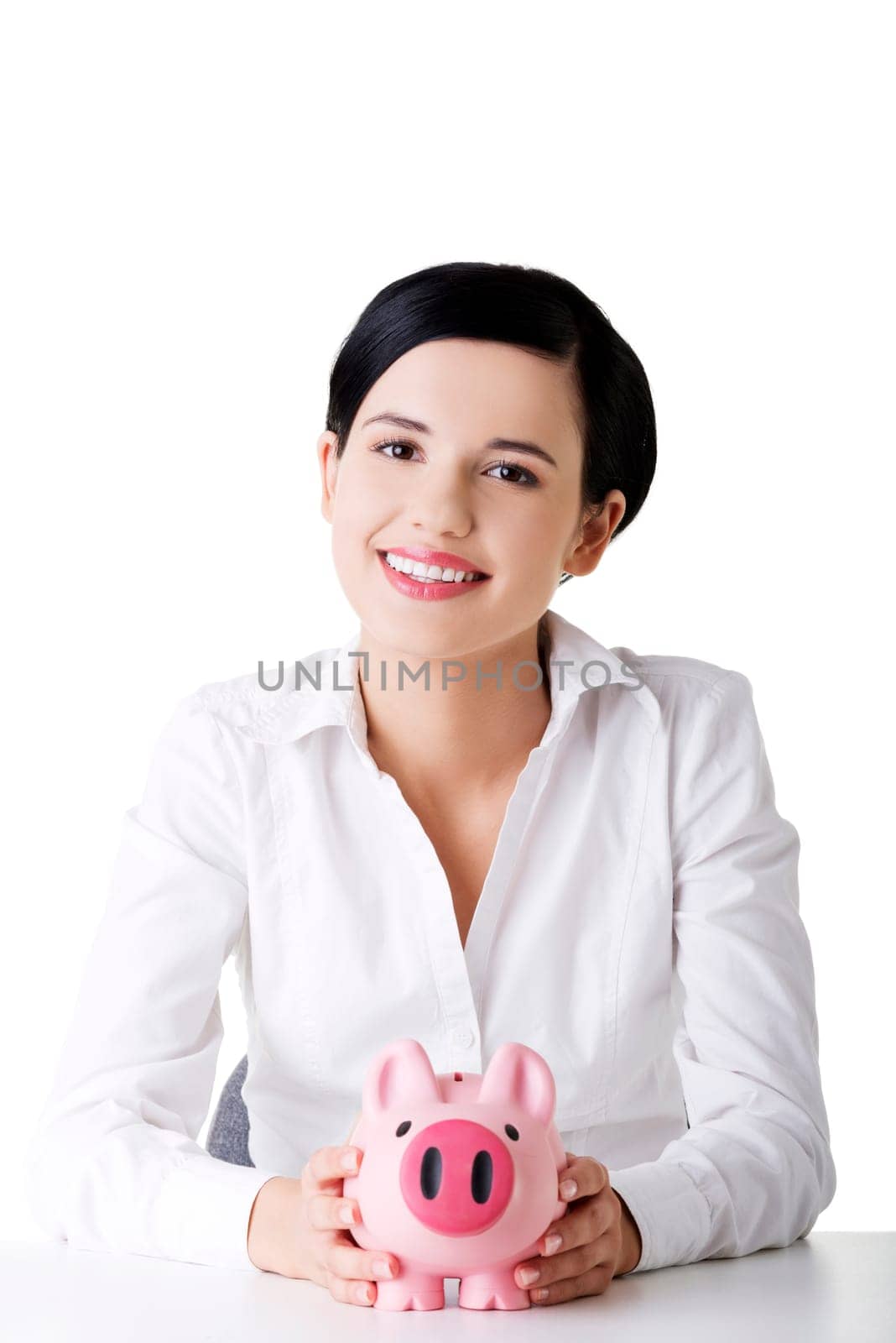 Happy business woman with her savings, isolated