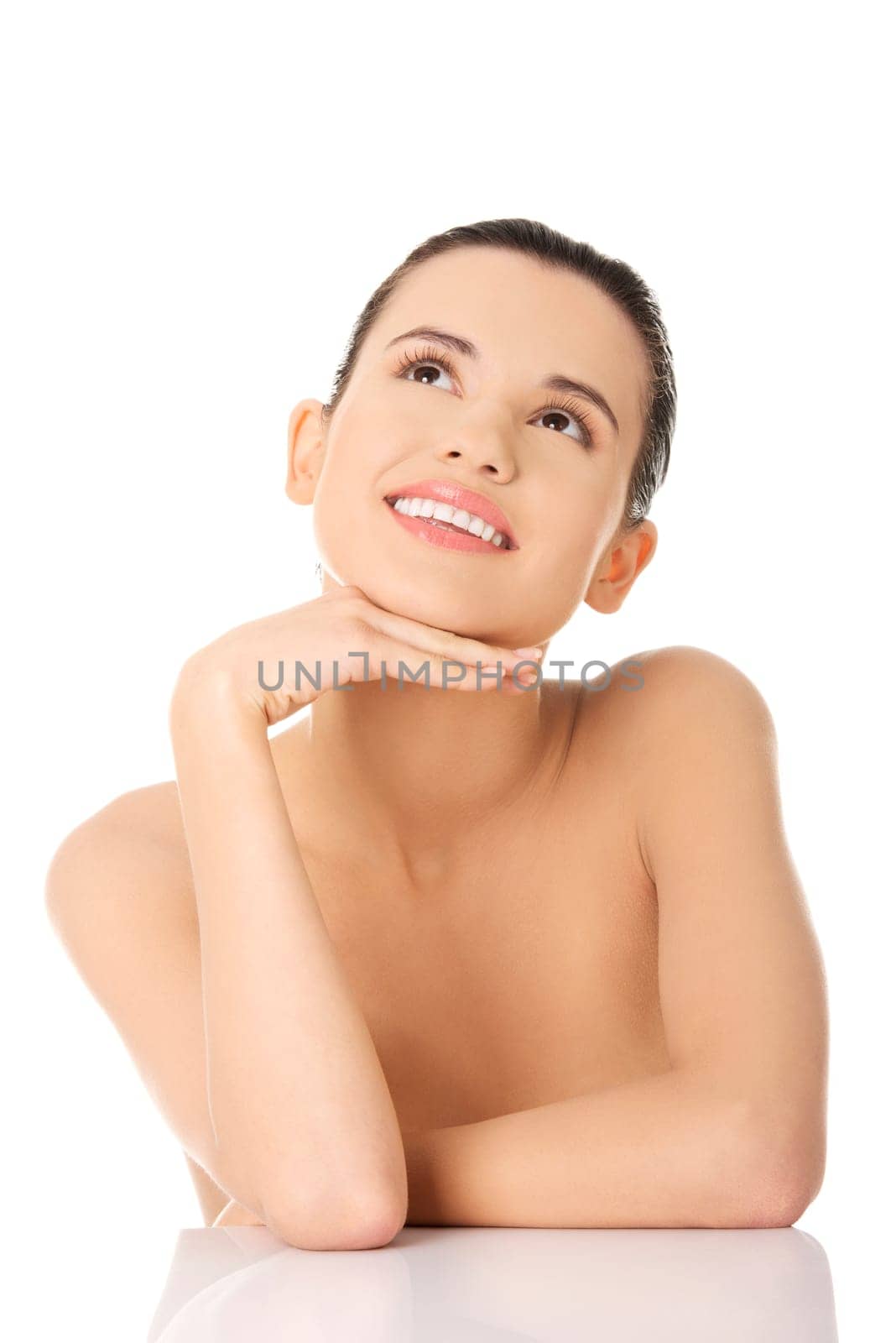 Portrait of a beautiful female model on white background