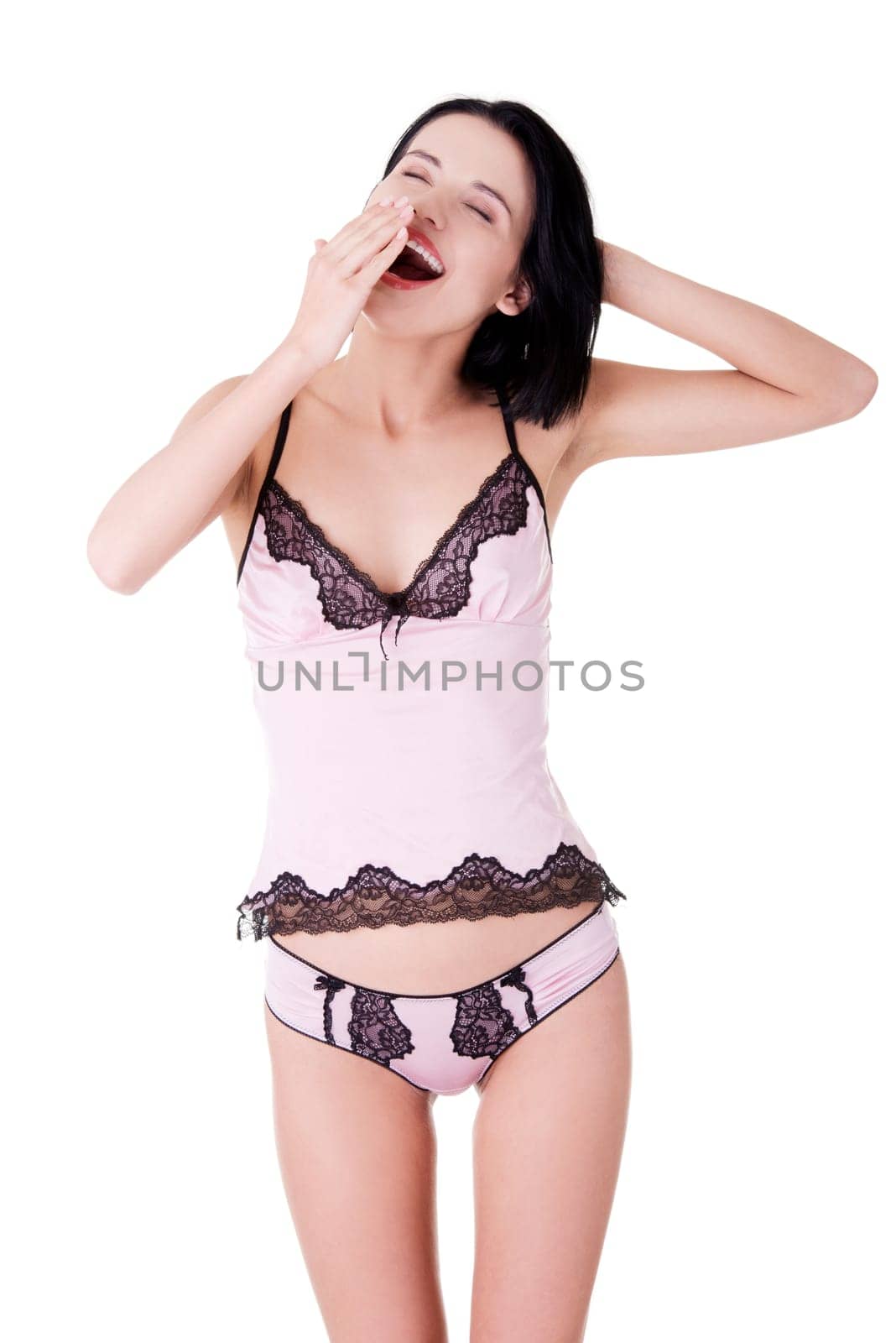 Beautiful young woman in pink underwear , isolated