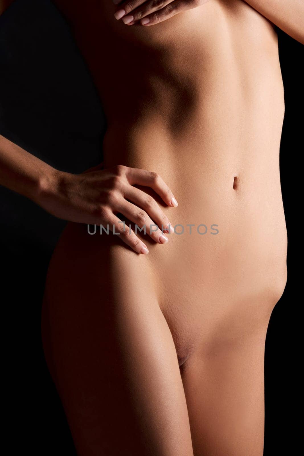 Sexy body nude woman. Naked sensual beautiful girl. Artistic color photo.